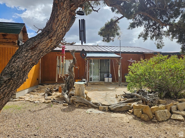 33383 W 8000 S, Duchesne, UT 84021 - back of house featuring metal roof, a standing seam roof, and a patio