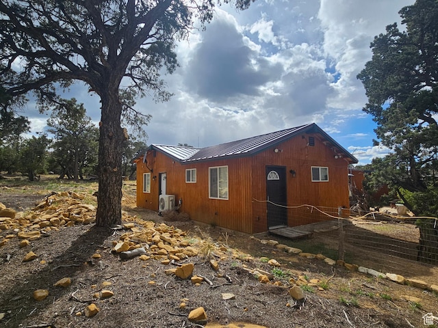 33383 W 8000 S, Duchesne, UT 84021 - view of property exterior with ac unit, a standing seam roof, and metal roof