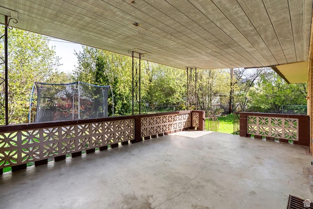 163 E 350 S, Logan, UT 84321 - view of patio with a fenced backyard and a trampoline