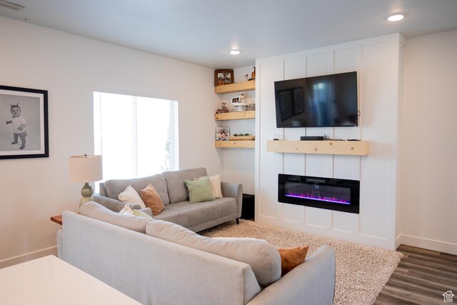 1809 S 1280 W, Logan, UT 84321 - living area featuring recessed lighting, baseboards, a glass covered fireplace, and dark wood-type flooring
