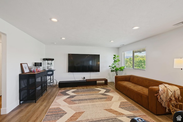 4356 W Elk Rim Rd, South Jordan, UT 84009 - living area with wood finished floors, recessed lighting, and baseboards