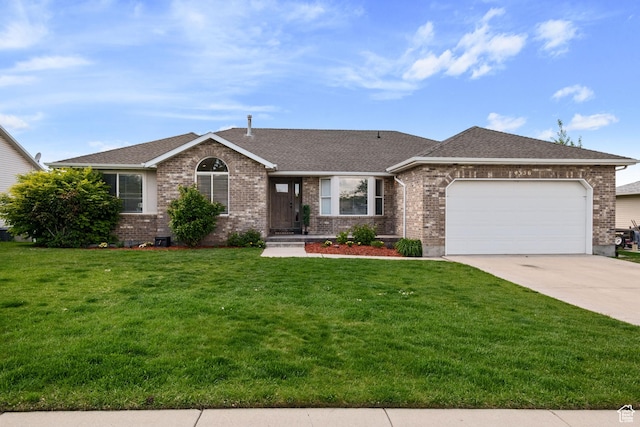 4356 W Elk Rim Rd, South Jordan, UT 84009 - ranch-style house featuring an attached garage, concrete driveway, a front yard, and brick siding