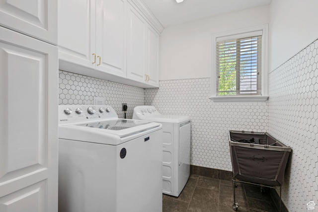 4356 W Elk Rim Rd, South Jordan, UT 84009 - laundry room featuring cabinet space, washer and dryer, baseboards, and dark tile patterned floors
