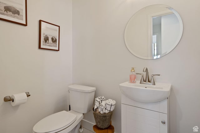 4356 W Elk Rim Rd, South Jordan, UT 84009 - bathroom featuring toilet, vanity, and baseboards