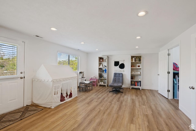 4356 W Elk Rim Rd, South Jordan, UT 84009 - game room with light wood finished floors, recessed lighting, and baseboards