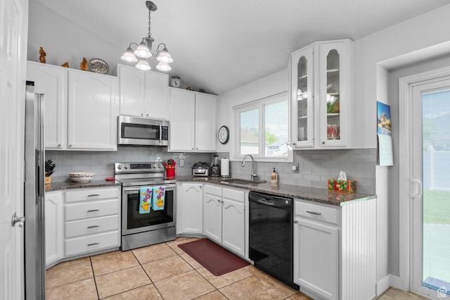 627 S 825 E, Layton, UT 84041 - kitchen featuring a sink, appliances with stainless steel finishes, backsplash, and lofted ceiling