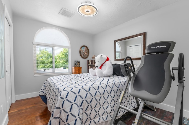 627 S 825 E, Layton, UT 84041 - bedroom with baseboards, wood finished floors, and visible vents