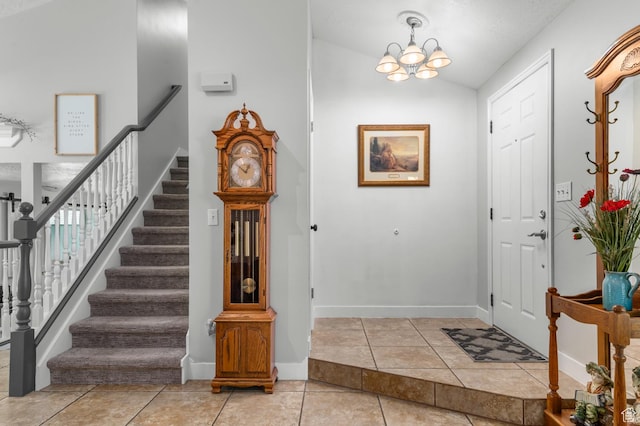 627 S 825 E, Layton, UT 84041 - foyer entrance with an inviting chandelier, stairs, baseboards, and light tile patterned flooring