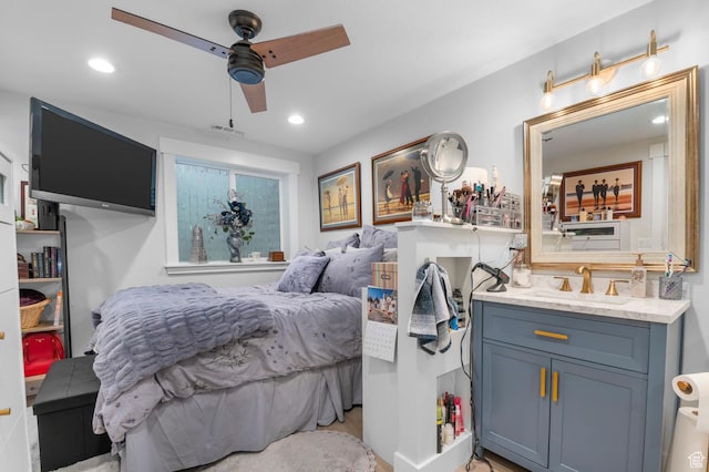 627 S 825 E, Layton, UT 84041 - bedroom featuring recessed lighting, a ceiling fan, visible vents, and a sink