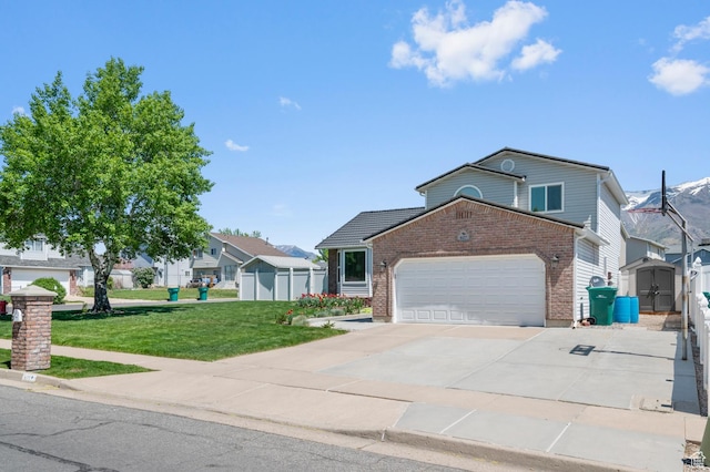 627 S 825 E, Layton, UT 84041 - view of front of property with brick siding, a garage, a shed, a front yard, and concrete driveway