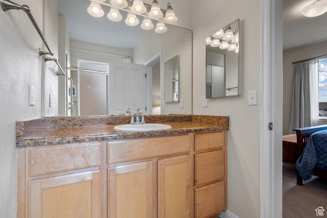 7673 N Red Oak E, Eagle Mountain, UT 84005 - ensuite bathroom featuring an enclosed shower, ensuite bathroom, and vanity