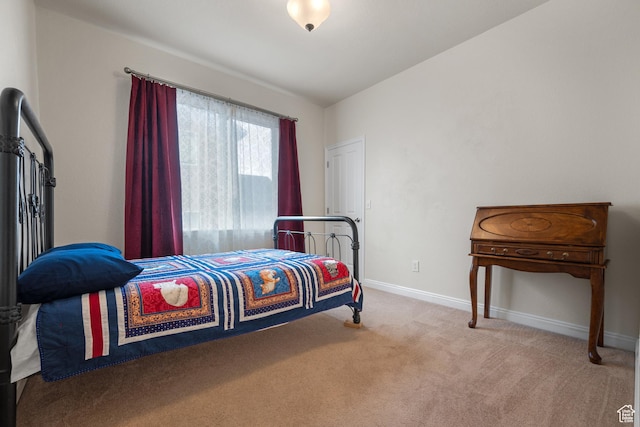 7673 N Red Oak E, Eagle Mountain, UT 84005 - carpeted bedroom featuring baseboards