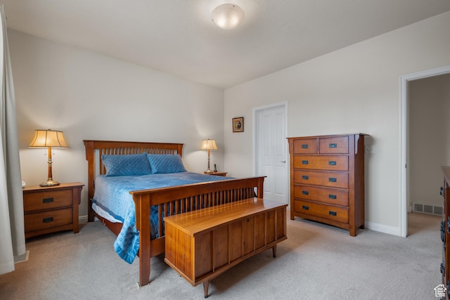 7673 N Red Oak E, Eagle Mountain, UT 84005 - bedroom featuring light colored carpet, baseboards, and visible vents