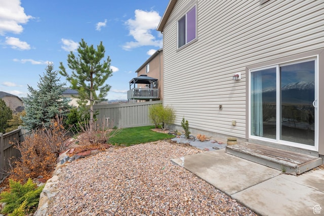 7673 N Red Oak E, Eagle Mountain, UT 84005 - view of yard featuring a patio and fence