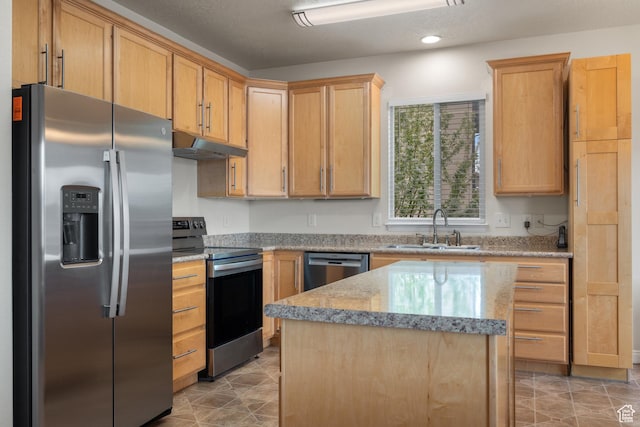 7673 N Red Oak E, Eagle Mountain, UT 84005 - kitchen featuring a sink, light brown cabinets, a center island, stainless steel appliances, and under cabinet range hood
