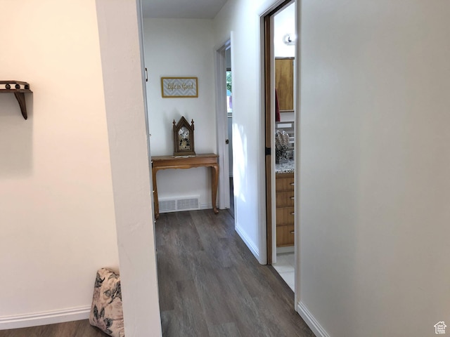 553 S 200 W, Brigham City, UT 84302 - hall with baseboards, dark wood finished floors, and visible vents