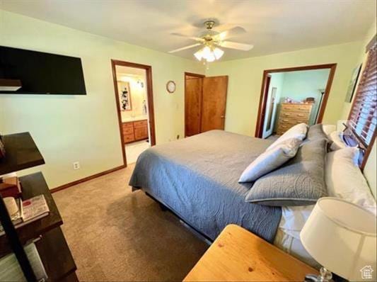 1752 Cedar View Rd, Soda Springs, ID 83276 - bedroom featuring carpet flooring, baseboards, ensuite bath, and ceiling fan