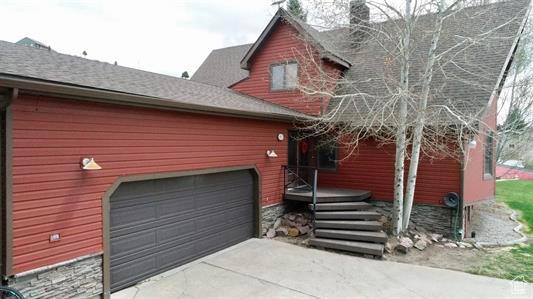 1752 Cedar View Rd, Soda Springs, ID 83276 - view of front of house featuring driveway and a garage