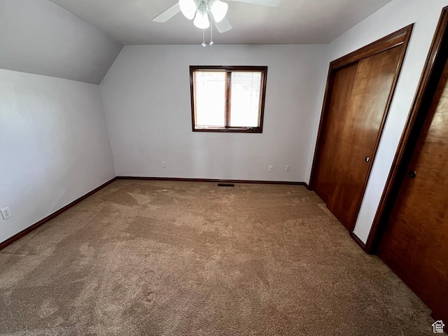 1752 Cedar View Rd, Soda Springs, ID 83276 - unfurnished bedroom featuring carpet, vaulted ceiling, baseboards, and a ceiling fan