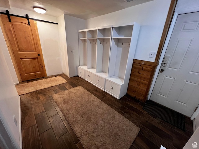 1752 Cedar View Rd, Soda Springs, ID 83276 - mudroom with a barn door and dark wood finished floors