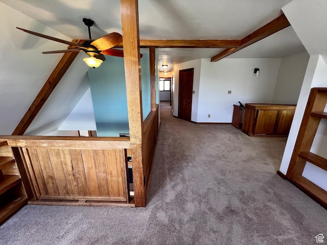 1752 Cedar View Rd, Soda Springs, ID 83276 - additional living space with carpet flooring, ceiling fan, beam ceiling, a dry bar, and baseboards