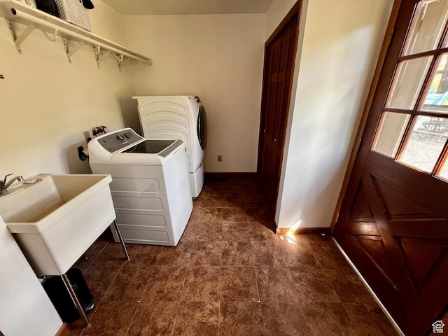 1752 Cedar View Rd, Soda Springs, ID 83276 - laundry room featuring washing machine and dryer and baseboards