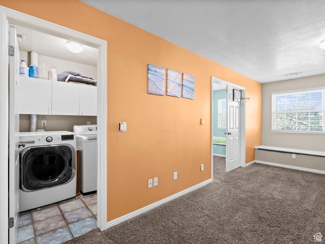 1415 S Bridgeview Dr W, Layton, UT 84041 - laundry area with baseboards, cabinet space, light colored carpet, and washing machine and clothes dryer