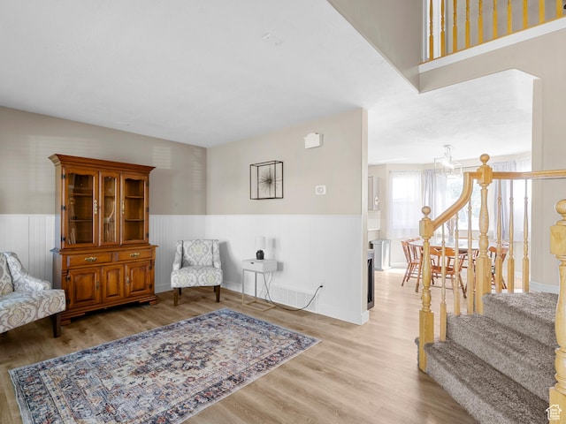 1415 S Bridgeview Dr W, Layton, UT 84041 - sitting room with wood finished floors and a wainscoted wall