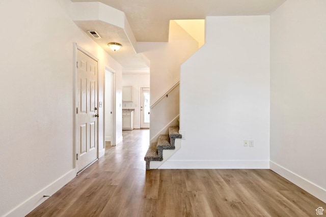 14499 S Siltstone Rd W, Herriman, UT 84096 - foyer featuring wood finished floors and stairway