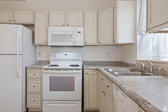14499 S Siltstone Rd W, Herriman, UT 84096 - kitchen with white appliances, light countertops, and cream cabinetry