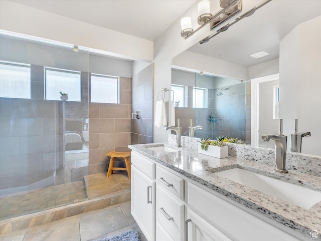 2813 W Hidden Moose Ln, Lehi, UT 84043 - full bathroom featuring a sink, walk in shower, and double vanity