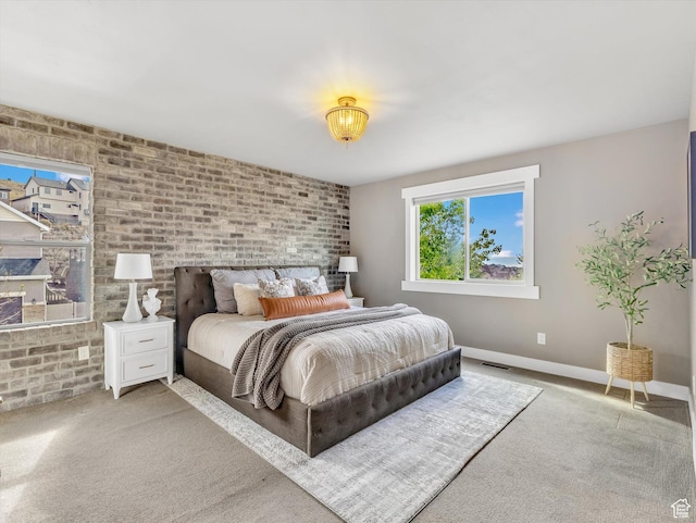 2813 W Hidden Moose Ln, Lehi, UT 84043 - bedroom featuring carpet flooring, brick wall, visible vents, and baseboards