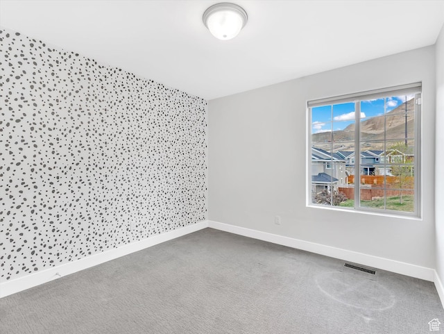 2813 W Hidden Moose Ln, Lehi, UT 84043 - empty room featuring baseboards, carpet floors, and visible vents