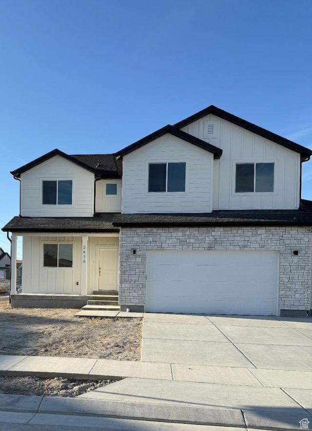 1097 N 580 E, Nephi, UT 84648 - traditional-style house with a garage, board and batten siding, and driveway