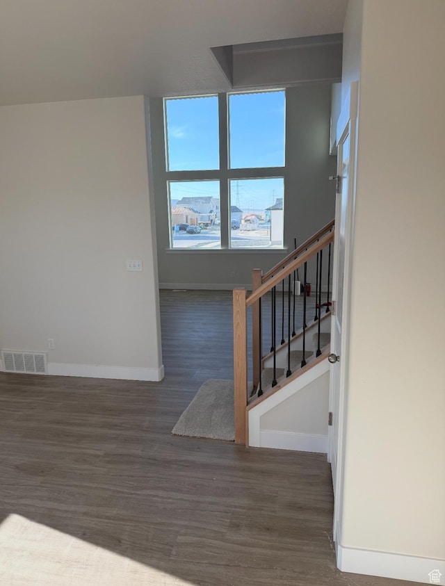 1097 N 580 E, Nephi, UT 84648 - staircase with visible vents, baseboards, and wood finished floors