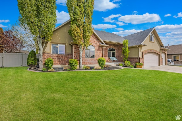 454 N 3550 W, Layton, UT 84041 - view of front of home featuring concrete driveway, stucco siding, brick siding, a shingled roof, and an attached garage