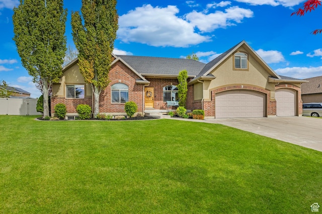 454 N 3550 W, Layton, UT 84041 - view of front facade featuring a garage, driveway, stucco siding, brick siding, and roof with shingles