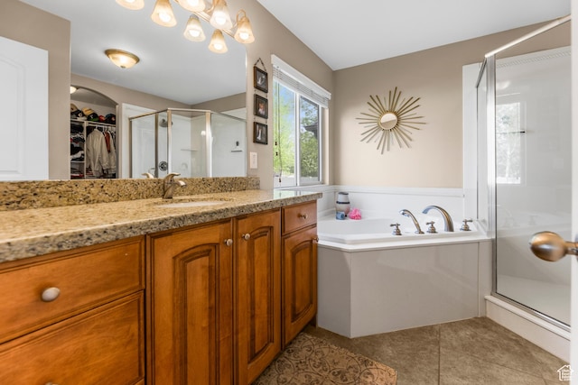 454 N 3550 W, Layton, UT 84041 - bathroom with a shower stall, vanity, a bath, tile patterned flooring, and a spacious closet