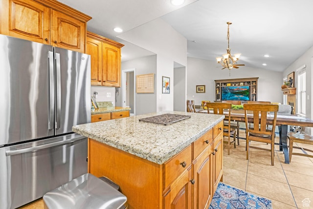 454 N 3550 W, Layton, UT 84041 - kitchen featuring freestanding refrigerator, a chandelier, a kitchen island, light stone countertops, and recessed lighting