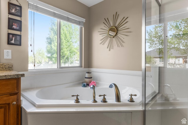 454 N 3550 W, Layton, UT 84041 - bathroom with vanity and a garden tub