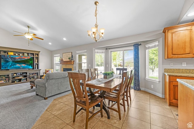 454 N 3550 W, Layton, UT 84041 - dining area featuring light tile patterned floors, vaulted ceiling, recessed lighting, a chandelier, and a fireplace