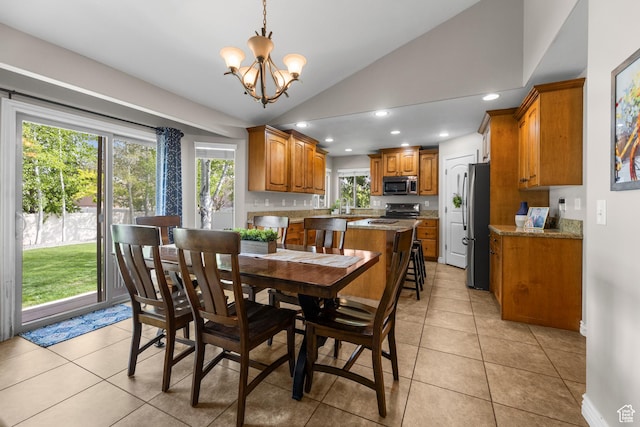 454 N 3550 W, Layton, UT 84041 - dining area featuring vaulted ceiling, a chandelier, light tile patterned floors, and recessed lighting
