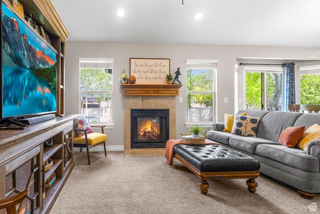 454 N 3550 W, Layton, UT 84041 - carpeted living area with healthy amount of natural light, a tiled fireplace, and recessed lighting