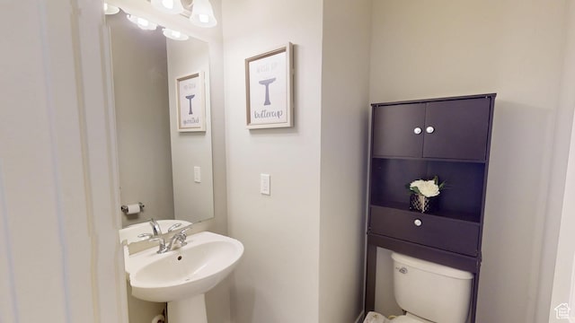 10627 S Lake Terrace Ave S, South Jordan, UT 84009 - half bathroom featuring a sink and toilet