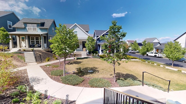 10627 S Lake Terrace Ave S, South Jordan, UT 84009 - view of front of property with a residential view, covered porch, and roof with shingles