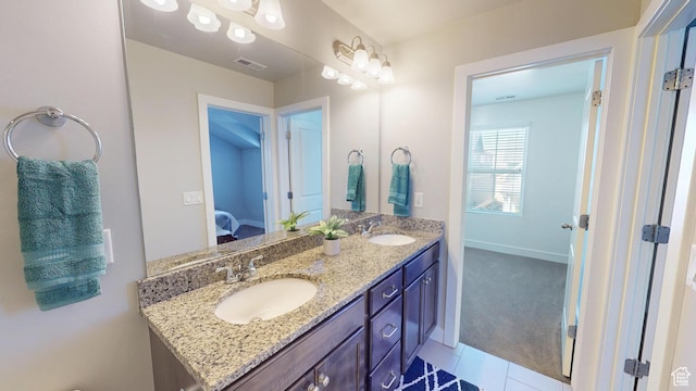 10627 S Lake Terrace Ave S, South Jordan, UT 84009 - bathroom featuring ensuite bathroom, double vanity, baseboards, and tile patterned floors