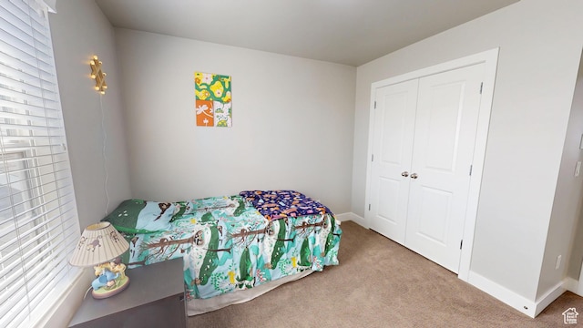 10627 S Lake Terrace Ave S, South Jordan, UT 84009 - carpeted bedroom featuring a closet and baseboards