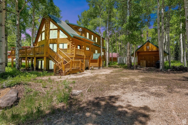 4417 Buck Way Unit 2029, Heber City, UT 84032 - rear view of house with stairway, a wooden deck, log siding, and an outdoor structure