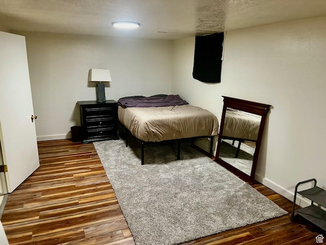 374 W 500 N, Logan, UT 84321 - bedroom featuring baseboards and wood finished floors