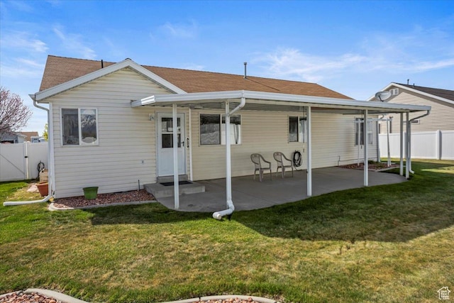 5448 S 4025 W, Roy, UT 84067 - back of house featuring fence, a gate, a yard, and a patio area